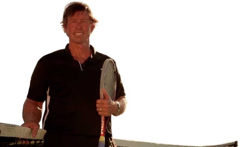 Mike Van Zutphen smiling on court at sunset